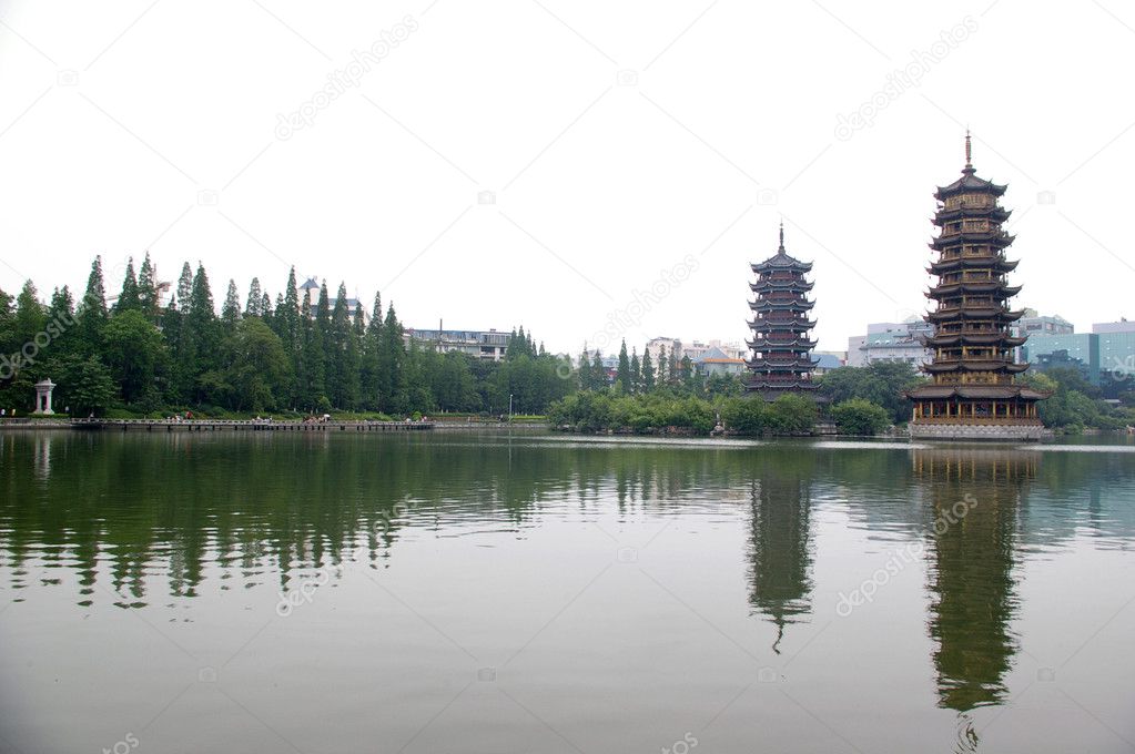 Golden tower and silver tower in the city of Guilin, China
