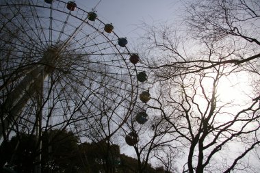 Ferris wheel against sky clipart