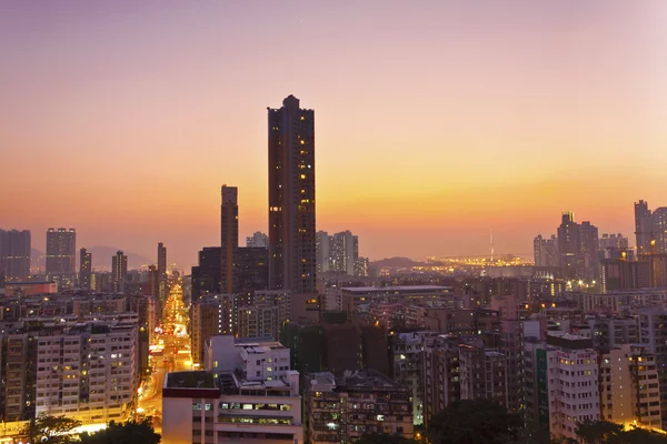 Hong kong centrum stad scène bij zonsondergang — Stockfoto