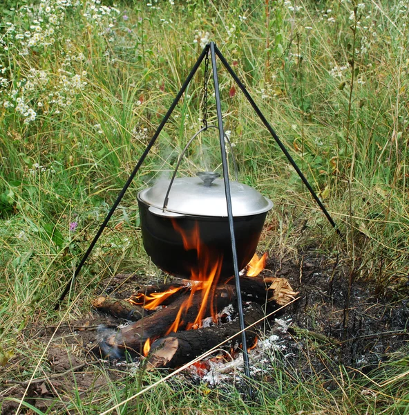 stock image Cauldron on a campfire