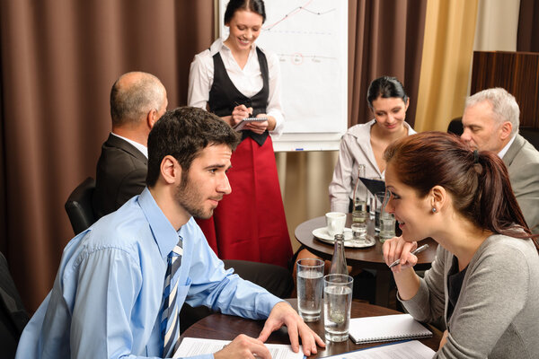 Business have company meeting at restaurant waitress ordering