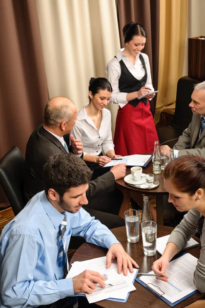 Business meeting dealing at restaurant Stock Photo