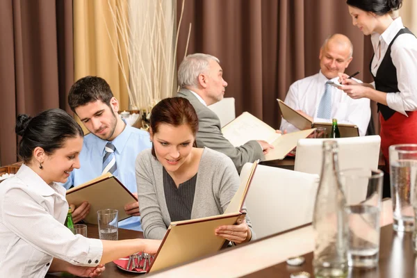Business lunch executives looking menu restaurant Stock Photo