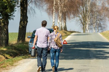 Fill up petrol couple with car trouble clipart