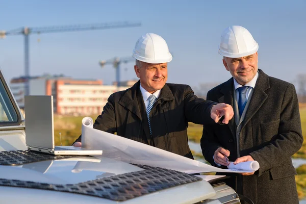 Architect developer point at construction site — Stock Photo, Image