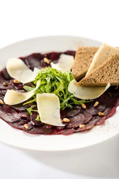 Vegetarian carpaccio with beetroot,nuts and toast — Stock Photo, Image