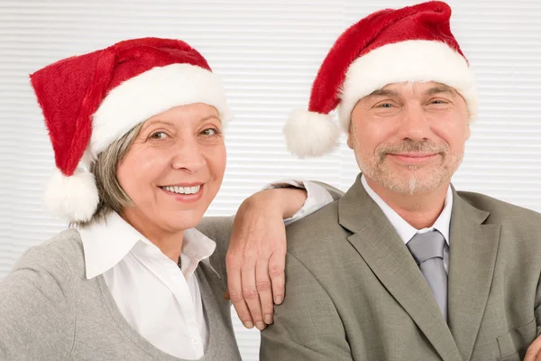 Chapeau de Noël seniors gens d'affaires amusant rire — Photo
