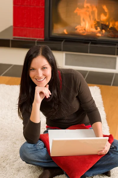 Home living happy woman work computer fireplace — Stock Photo, Image