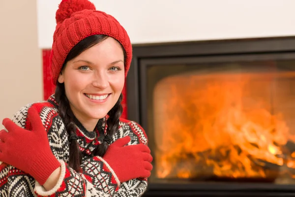 Fireplace warming up happy woman winter home — Stock Photo, Image