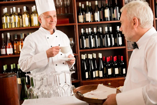 Chef cook drink coffee waiter tray restaurant Stock Image