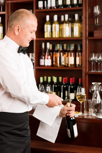 stock image Wine bar waiter opening bottle restaurant