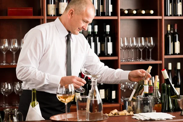 Wine bar waiter happy male in restaurant Stock Image