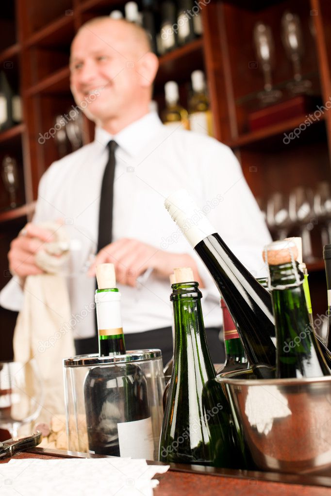 Wine bar bottles waiter in restaurant