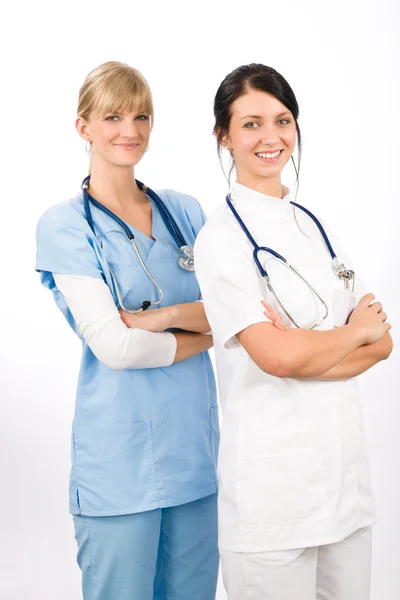Medisch team arts jonge verpleegster vrouwelijke glimlachen — Stockfoto