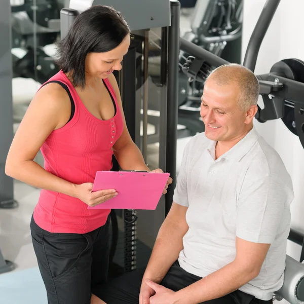 Fitness personlig plan aktiv man med tränare — Stockfoto