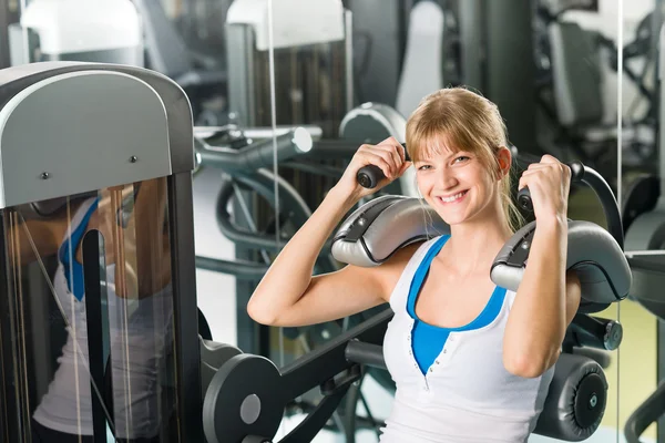 Fitness center young woman exercise abdominal — Stock Photo, Image