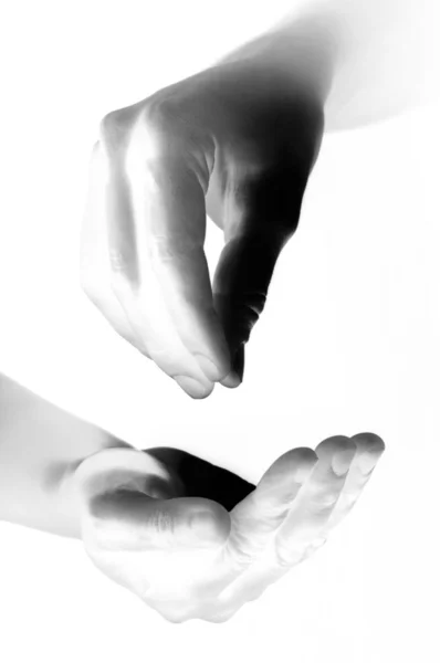 Hand geven aan een andere hand grijs worden weergegeven — Stockfoto