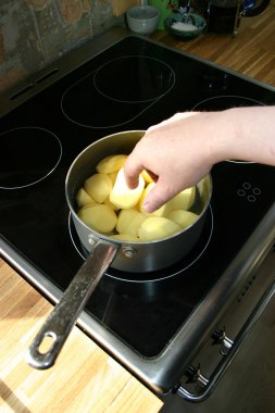 Potatoes cooking saucepan clipart