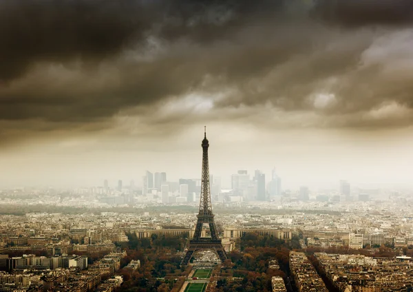 stock image Eiffel tower in Paris and stormy sky