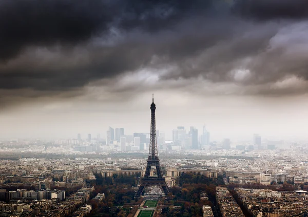 stock image Eiffel tower in Paris and stormy sky