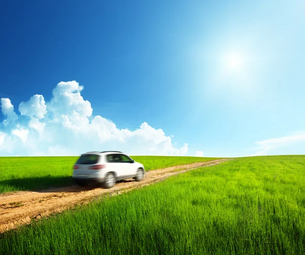 Ground road and blurred car — Stock Photo, Image