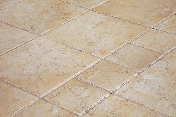 Grote stenen tegels op de vloer — Stockfoto