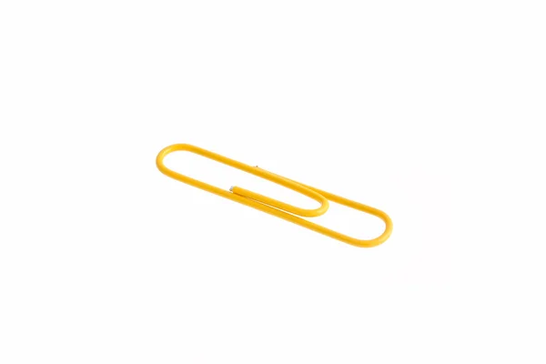 Clipe de papel amarelo isolado no fundo branco — Fotografia de Stock