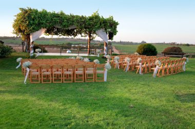 Outdoor wedding ceremony canopy (chuppah or huppah) clipart