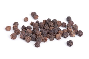 Pile Black pepper (Piper nigrum) isolated on white background. clipart