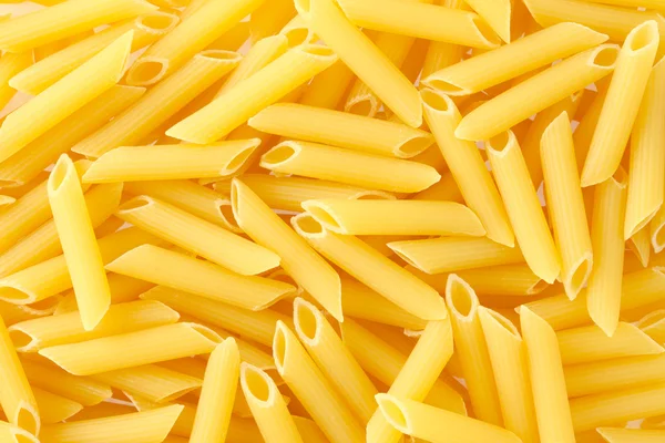Pasta Penne texture background. — Stock Photo, Image