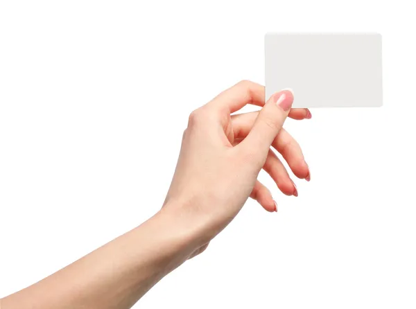 Mano femenina sosteniendo una tarjeta de visita en blanco — Foto de Stock