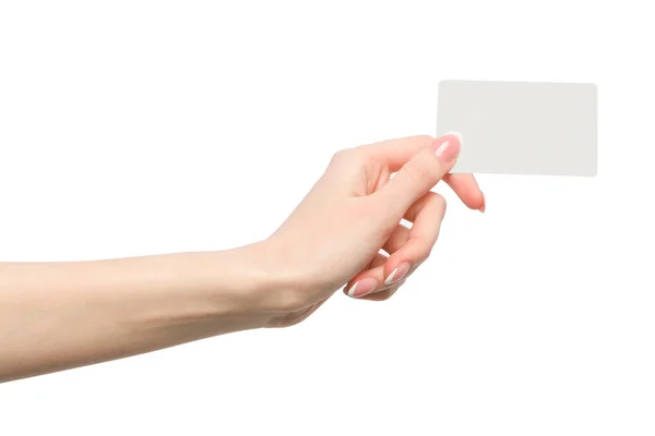 Mão feminina segurando um cartão de visita em branco — Fotografia de Stock