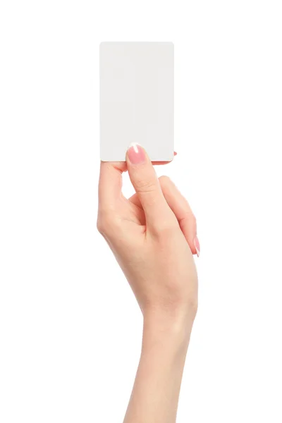 Mão feminina segurando um cartão de visita em branco Imagens Royalty-Free