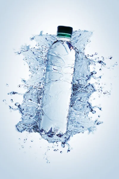 Bottle with pure water and splash around it — Stock Photo, Image