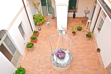 Courtyard of an Italian residence clipart