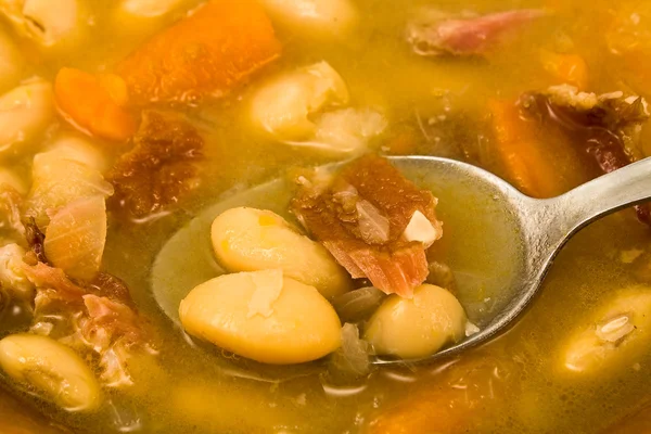 stock image Baked beans and meat in spoon