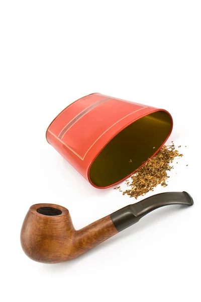 Tütün boru ile kırmızı bir teneke kutu — Stok fotoğraf