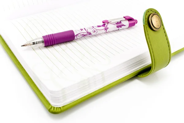 Pen and green notebook — Stock Photo, Image