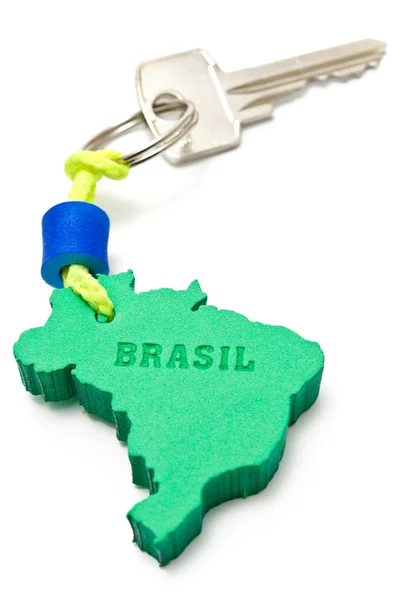 House key with tag in form of Brazil border — Stock Photo, Image