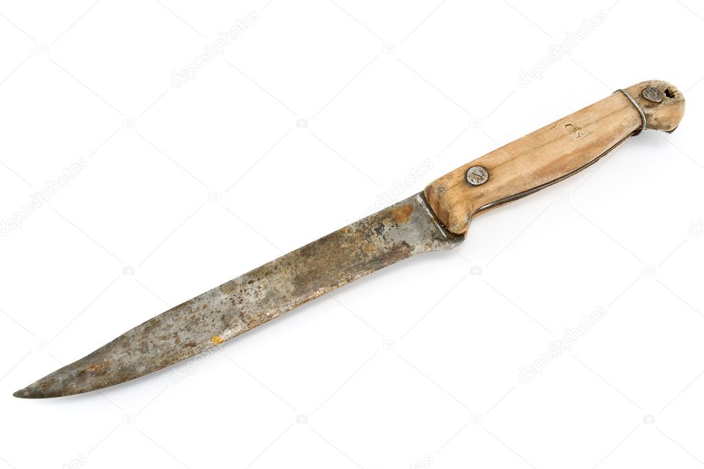 Old rusty knife with wooden handle