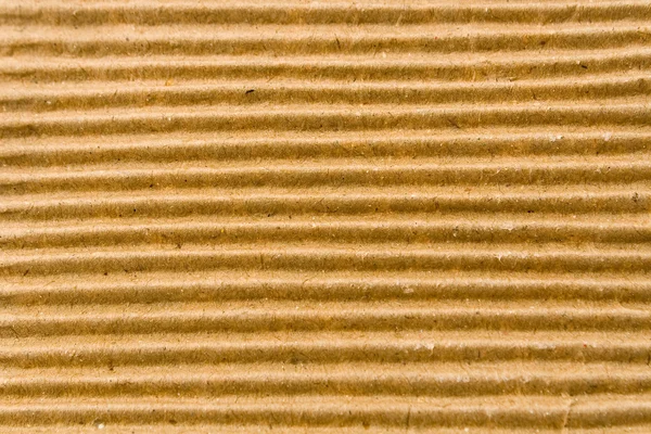 Textura de papelão corrugado marrom — Fotografia de Stock