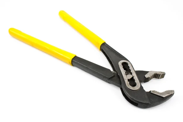 Verstelbare sleutel met een gele greep — Stockfoto
