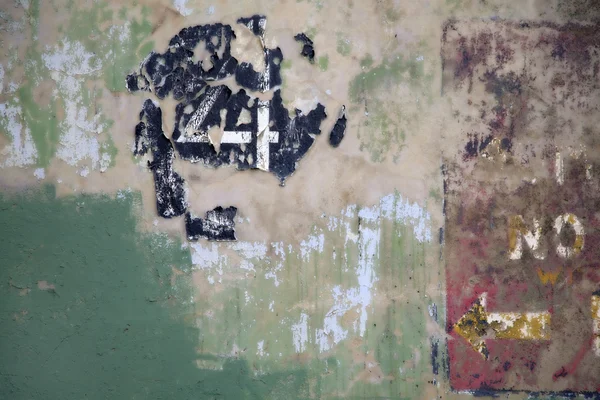 stock image The number four (4) on a wall of peeling paint