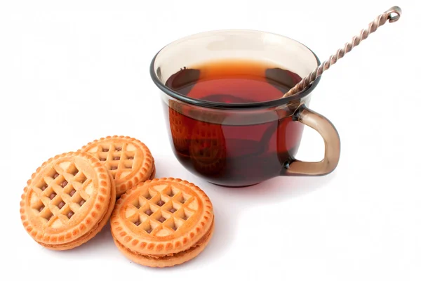 stock image Cup of black tea and biscuits