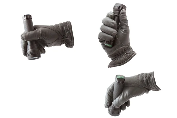 Hand in de handschoen met een zaklamp — Stockfoto