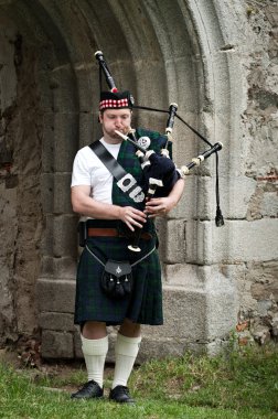 Man playing Bagpipe clipart