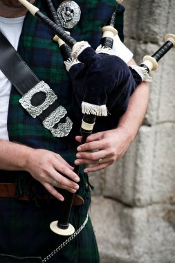 Hands on a Bagpipes clipart