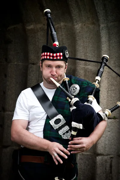 Bagpiper in Action — Stock Photo, Image