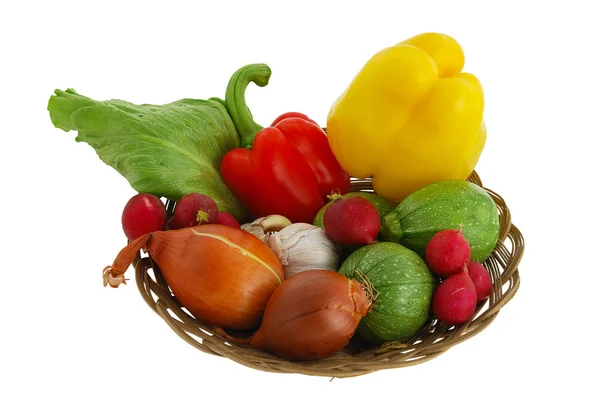 Mix of fresh vegetables in straw bowl — Stock Photo, Image