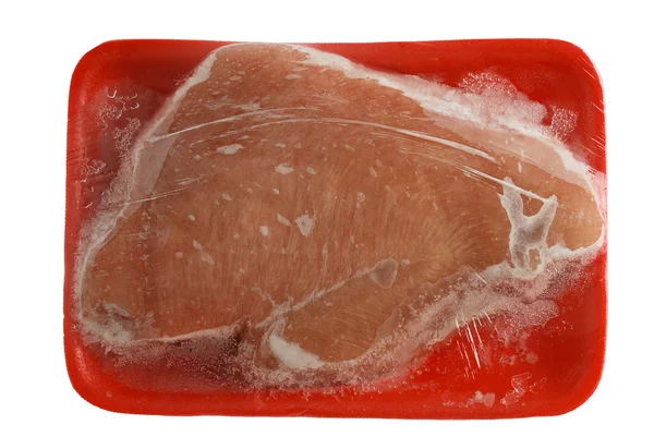 Vista superior de pechuga de pavo crudo congelada en bandeja de carne de espuma — Foto de Stock